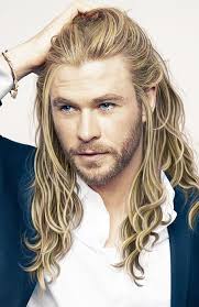 Long blonde hair in twisted style with low bun finish. 30 Sexy Blonde Hairstyles For Men In 2021 The Trend Spotter