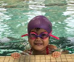The theme of swimming in pools as a metaphor for drinking and alcoholism could be a reference to the 1964 short story the swimmer by. J W Hayden Recreation Centre