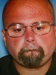 Arson suspect turns himself in