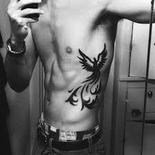 Bird Tattoo On Ribs Men 40 Tribal Phoenix Tattoo Designs For Men Mythology Ink Ideas Tetovalas Fonix Tetko