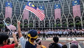 The crowd had to bundle up for the parade. National Day 2018 Crowd Expresses Love For Malaysia Free Malaysia Today Fmt
