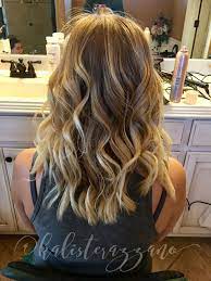 Then, gently slide the iron a little way. Wavy Hair Curled With A Hair Straightener Curled Hairstyles Hair Hair Styles