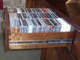 Or, you can store your music and movies with your stereo in a cd/dvd stereo cabinets, of which there are several. Side View Of Drawer Cd And Dvd Storage Cabinet