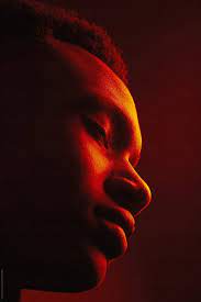 African American Man Portrait Under Red Lights Stocksy United Studio Portrait Photography Creative Portrait Photography Male Portrait