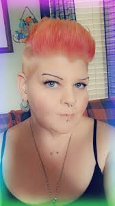 Who can style and cut natural hair in Houston?