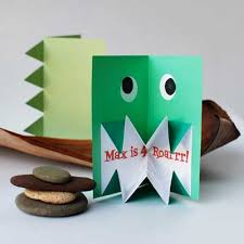Pop up card instructions fold a piece of white paper in half; Make Amazing Pop Up Origami Dinosaur Invitations