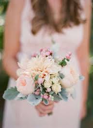 Boutonnieres are a cute way to match the groom with his betrothed on the wedding day. Minimal Bridal Bouquet Arabia Weddings