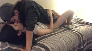 Skinny brunette Alaska Zade enjoying this college dorm room makeout session  | amateurest.com