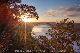 A rainbow overlooks the 360 bridge (pennybacker bridge) surrounding hills and lake austin aerial view from a helicopter of the 360 bridge (pennybacker bridge) overlooking lake austin. Sunrise At The 360 Bridge In December 2 Austin Texas Images From Texas
