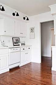 Rachel Schultz Building Out The Toe Kicks On Kitchen Cabinets Kitchen Cabinets Toe Kick Laminate Flooring In Kitchen Kitchen Cabinets Trim