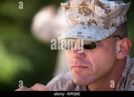 U.S. Marine Gunnery Sgt. Ryan Slusher watches his platoon work with the  Philippine Marines during amphibious