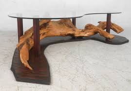 This elegant glass table fits into furnished rooms or apartments in different decoration styles. Unique Mid Century Modern Rustic Driftwood Glass Top Coffee Table Driftwood Coffee Table Glass Top Coffee Table Twig Furniture