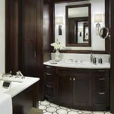 There's more than one method to make a bathroom look elegant and a few of the options revolve around the vanity. Espresso Bathroom Cabinets Design Ideas