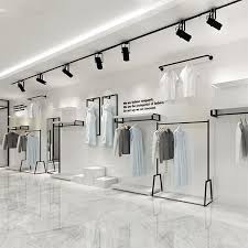 Store Wall Hanging Apparel Display Stands Supplies In 2020 Clothing Store Design Clothing Store Interior Clothing Displays