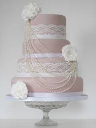 Love The Drama Of The Hanging Pearls Very Feminine With Lace Ribbon Flowers And Lace Repin By Pinteres Pink Wedding Cake Cake Lace Wedding Cakes Vintage