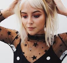 Premiere: Grace Ackerman Struggles to Keep "Faith" with Dark Passion