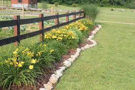 Split rail fencing is a simple but common fence used in paddocks and fields, a very popular and rustic fence for any large home or farm. A Bad Spot In The Yard Outdoor Garden Decor Landscape Borders Beautiful Landscaping