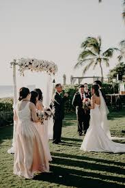 It's not the hilarious props or the professional quality images that stick in wedding photo booth and backdrops for hire is what makes the wedding events exciting. Classy Meets Tropical In This Gorgeous Four Seasons Resort Oahu Wedding Junebug Weddings