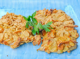 (gli intolleranti al lattosio possono utilizzare anche latte di soia o semplicemente acqua) sale; Cotolette Di Pollo Con Corn Flakes Al Forno
