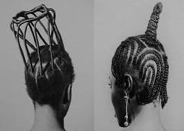 The other side has a stylish pattern while the braids have braid cuffs and beads. African Up Do Top 5 Questions Men Ask Bibini4gh