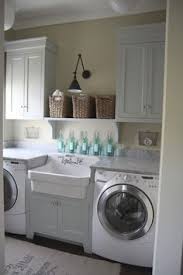 Tall units like this is perfect for storing ironing boards and standing/stick vacuum cleaners. 120 Laundry Room Storage Ideas Laundry Room Laundry Room Storage Laundry