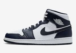 A Usa Friendly Air Jordan 1 Mid In Navy And Gold Is Dropping Soon Air Jordans Jordan 1 Mid Gold Metal