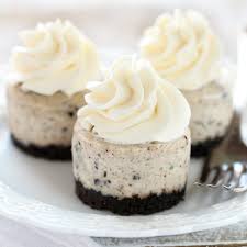 An Easy Two Ingredient Oreo Crust Topped With A Smooth And Creamy Oreo Cheesecake Filling These Mini Oreo Cheesecak Mini Cheesecake Recipes Oreo Cheesecake Recipes Mini Cheesecakes