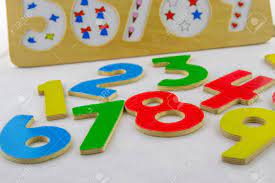 While artwork, piece size, and. Wooden Puzzles With Colorful Numbers On A White Backgrounda Stock Image Stock Photo Picture And Royalty Free Image Image 118009980