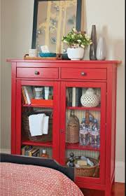 Red Painted Hemnes Linen Glass Front Cabinet 299 Ikea Featured In Better Homes And Gardens April 2013 Cabinet Guest Room Storage Linen Cabinet