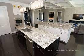 But the dark black mineral patches will create little pockets and islands of contrast. White Granite Countertops In St Louis Arch City