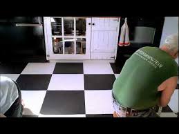 new rubber tile floor put down in