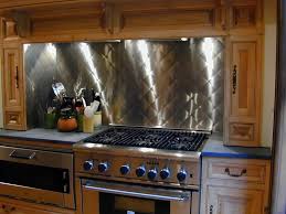 A stainless steel backsplash would also reflect the light, helping a small kitchen appear bigger and brighter. Stainless Steel Backsplash Kitchen Kitchen Sohor