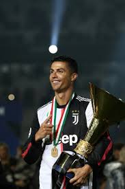 Cristiano ronaldo kisses the serie a title trophy after juve's triumphcredit: Guardiola Linked With Shock Juventus Switch Capital Sports