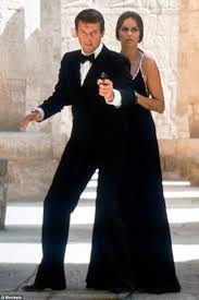 The 77 Most Iconic Bond Girl Outfits Revealed Bond Girl Outfits James Bond Dresses Bond Outfits
