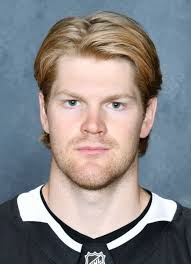 Player photos for the 2014-15 U. of New Hampshire at hockeydb.com