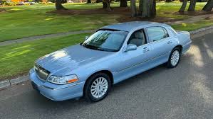 Image result for Light Ice Blue 2005 Town Car