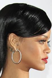 The singer's venture into face tattoos started with a queen of hearts symbol on her left temple and the phrase espíritu libre (meaning free spirit in. Rihanna S Tattoos And What They Mean 2021 Celebrity Ink Guide