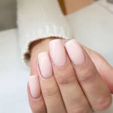 Gel Polish Pale Pink Manicured nails with pink nail polish.