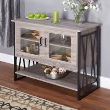 Its ample storage space can be used for flatware, dishes or even table linens. Seneca Glass Metal Wood Laminate Small Dining Room Buffet Cabinet Storage Buy Online In United Arab Emirates At Desertcart Ae Productid 32359358