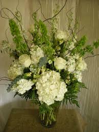 Lovely Arrangement Idea With Bells Of Ireland Around Room At Coffee Station White Flower Arrangements Large Floral Arrangements Large Flower Arrangements