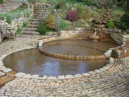 The cheapest and most ecologically sound way to build a swimming pool is simply to hollow a hole in the ground. Quest In Pictures Garden Water Feature Outdoor Backyard Water Park Ideas