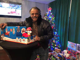 James Winbush dropping toys off for...