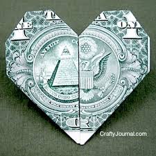 Flip to the other side which is the face of the heart & fold the top downward away from the 2 tips. Dollar Bill Heart Origami