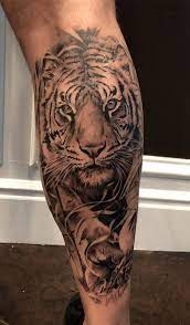 Tiger Tattoos For Men In 2020 Tiger Tattoo Design Tiger Tattoo Leg Tattoo Men