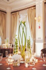Modern calla and thistle square centerpiece. Tall Calla Lily Centerpieces