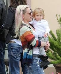 In the video for 'trouble' p!nk can be seen turning up to a pub in the wild west causing trouble, whilst her hair in a blonde quiff with long braids behind doesn't appear to move an inch! Pink Shows Off New Long Hairstyle As She Carries Daughter Willow In Los Angeles Capital