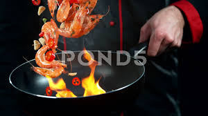 Super Slow Motion Shot Of Chef Holding Frying Pan And Falling Shrimps Into Fire Stock Footage Ad Shot Chef Super Holding Chef Cuisine Slow