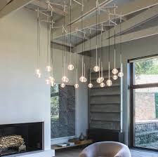 With a vaulted ceiling, look for interesting chandeliers and pendant lights for style and add recessed lighting for additional ambient illumination. Dream Big 19 Vaulted Ceiling Lighting Ideas Ylighting Ideas
