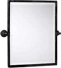 Pivot mirrors are ideal for bathrooms because they are secured to the wall with a swivel rod that allows for easy mobility and adjustment based on the time of day and lighting in the space. Amazon Com Black Metal Framed Pivot Rectangle Bathroom Mirror Tilting Beveled Vanity Mirrors For Wall 23 X 24 Inches Kitchen Dining
