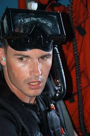 Aviation Warfare Systems Operator 2nd Class Alan TenBroek catches his  breath after deploying from a SH-60F Seahawk attached to Helicopter  Anti-Submarine Squadron Light (HSL) 51.